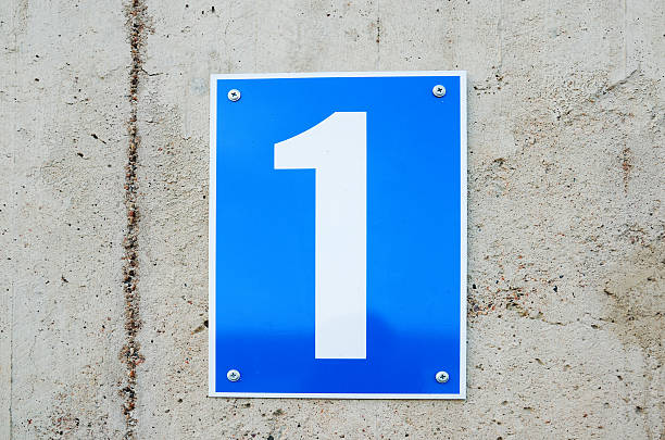 istock Sign with numeral one on concrete wall 119694059