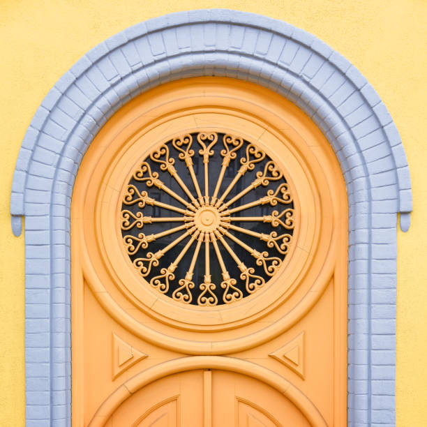 Colorful yellow door of the Alfama neighborhood. Lisbon, Portugal. Europe stock photo