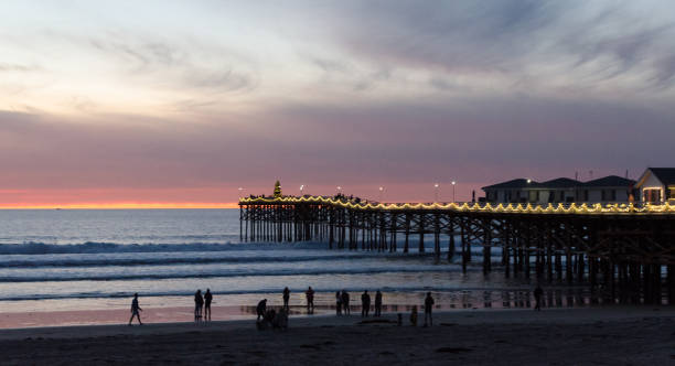 Christmas Sunset  At Crystal Pier, Strand, Pacific Beach, San Diego stock photo