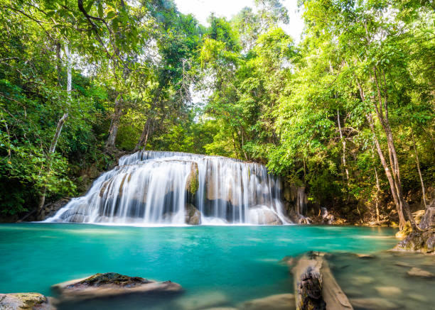 istock Waterfall and blue emerald water color in Erawan national park. 1196953954