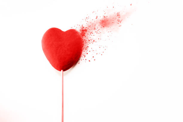 Woman hands holding broken heart