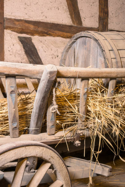 istock Old hay wagon with a slurry tanker 1196957647