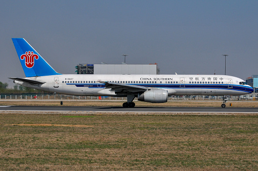 Beijing, China-May 1, 2010: A Boeing 757 aircraft of China Southern Airlines was taking off in Beijing International Airport.