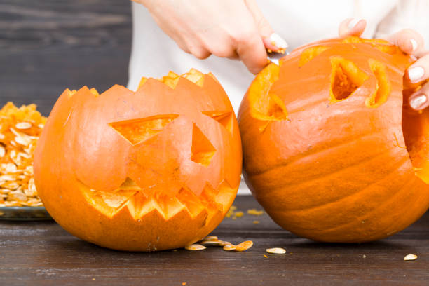 istock preparing a scary orange pumpkin lamp 1196961521