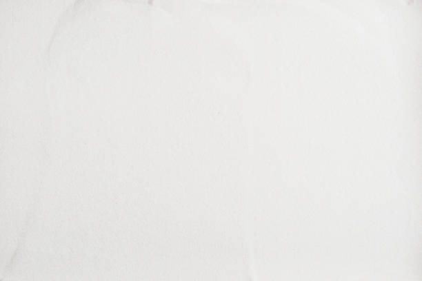 istock Seamless white sand background. Beach. Close-up 1196961630