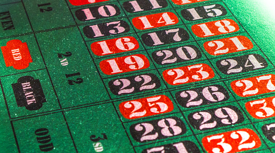Gambling. Casino gaming table background.