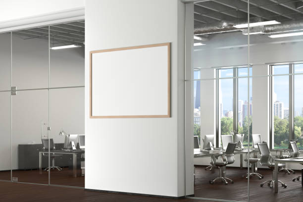 istock Blank horizontal poster mock up on the wall in office interior 1196966385