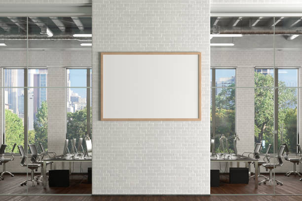 istock Blank horizontal poster mock up on the white brick wall in office interior 1196966439