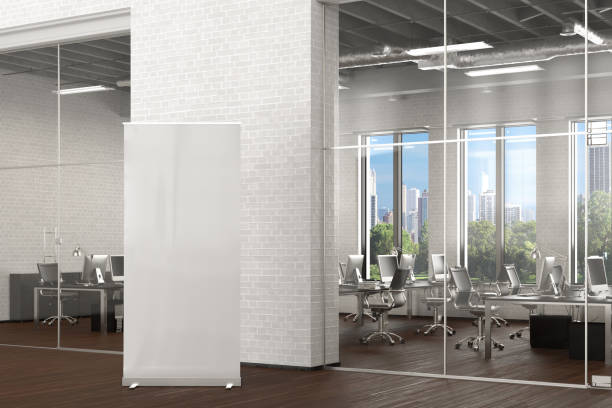 Blank roll up banner stand in office interior Blank roll up banner stand in white brick office interior. 3d illustration roll up banner photos stock pictures, royalty-free photos & images