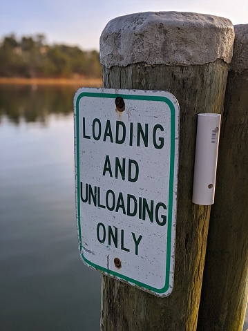 Loading And Unloading Sign At The Boat Dock Stock Photo - Download ...