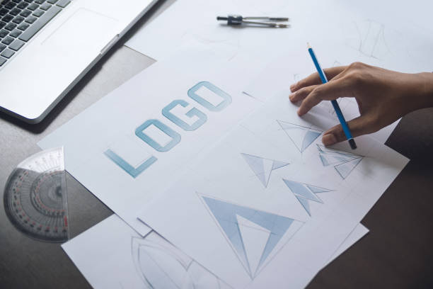 istock Graphic designer creative design sketch drawing logo Trademark brand Workspace 1196968928