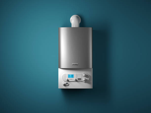 gas home boiler with electronic control panel on the wall of the house. - gas boiler imagens e fotografias de stock