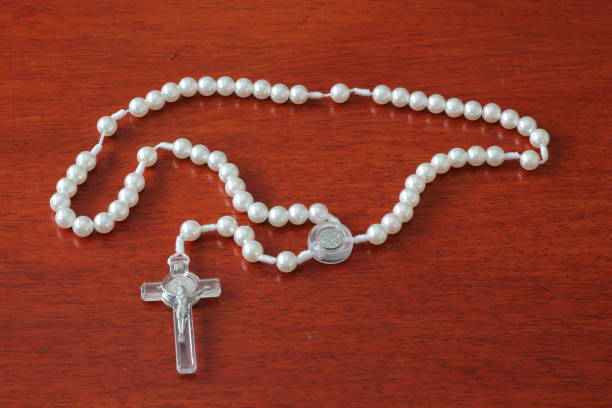 istock rosary in wood background 1196986215
