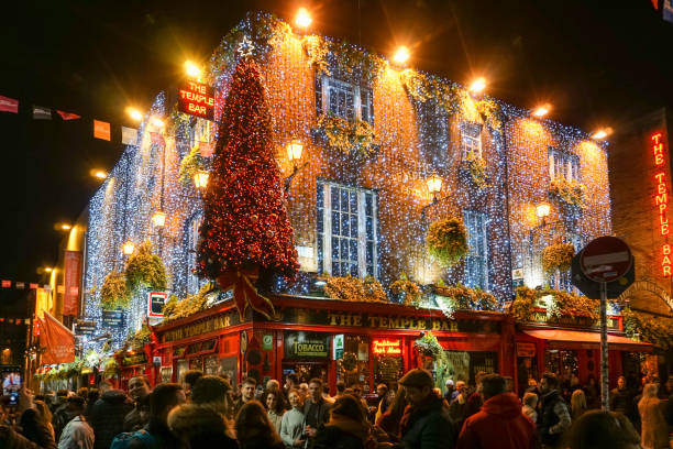 The Temple Bar Pub in Temple Bar, Dublin, Ireland. The Temple Bar Pub in Temple Bar, Dublin, Ireland, decorated with Christmas Lighting. guinness photos stock pictures, royalty-free photos & images