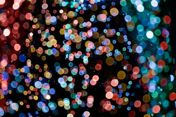 Busy bokeh lights constitute very festival and shining effect as colorful holiday background