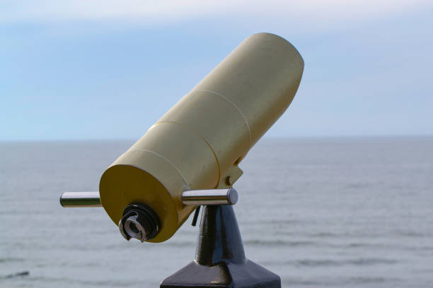 istock Tourist telescope for seascape exploring at mounting 1196994229