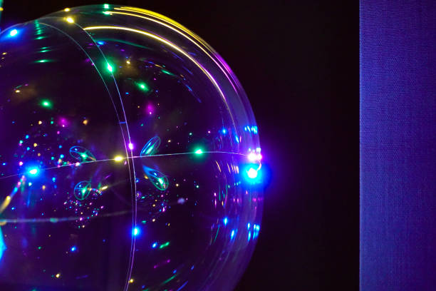 istock Colored lights in the form of a sphere on a dark background. Abstract dark background. Space emulation 1197000202