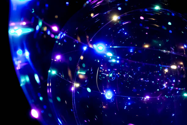 istock Colored lights in the form of a sphere on a dark background. Abstract dark background. Space emulation 1197000203