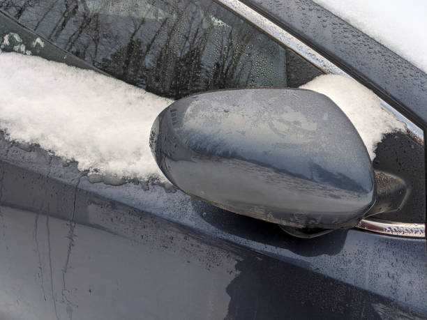 istock Side Mirror on a Car in Winter Close Up 1197000291