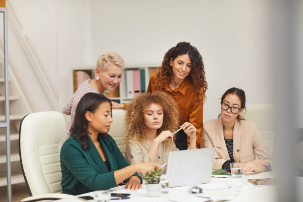 istock Five Modern Women In Office 1197000470