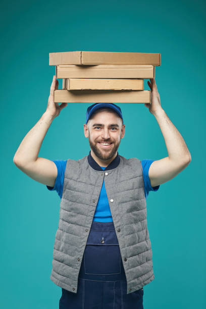 istock Happy Delivery Worker Portrait 1197001317