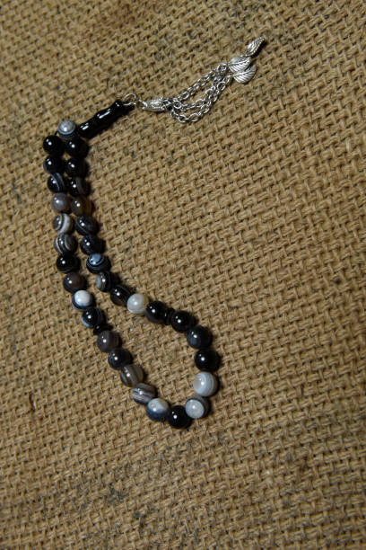 istock prayer beads necklace made of beads, black agate and silver 1197008243