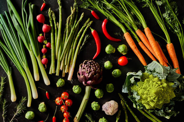 istock Fresh organic vegetables on a black background 1197011068