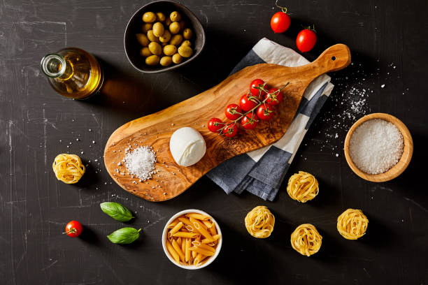istock Italian food plate on a black background 1197011731