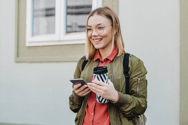 istock Modern young woman on the street 1197014199