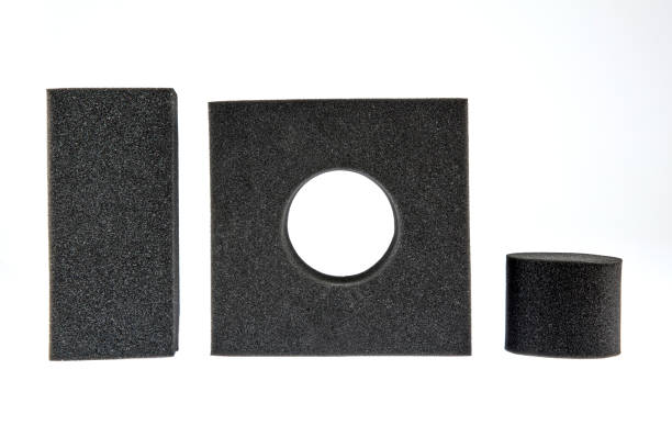 istock Black sponge foam in a shape of electronic or computer part, a protective equipment on white background. 1197020605