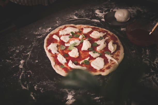 istock making Italian pizza at home 1197021440