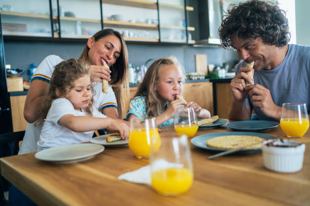 istock Family enjoying breakfast 1197022735