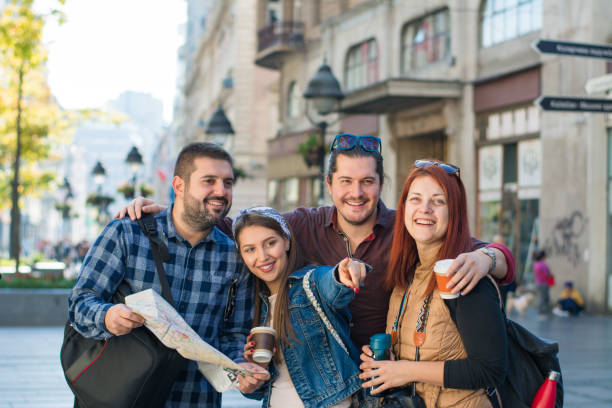 istock Group of young backpackers in the City 1197025124
