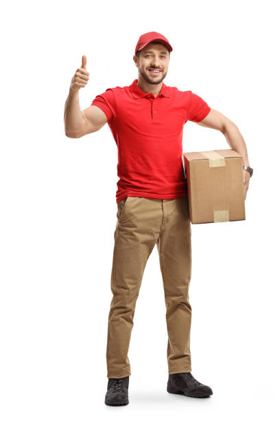 istock Delivery man with a package showing thumbs up 1197028298
