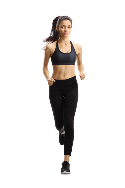 istock Beautiful girl jogging towards camera 1197028310