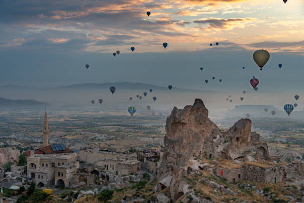 istock Watching the hot air balloons in Cappadocia 1197028748