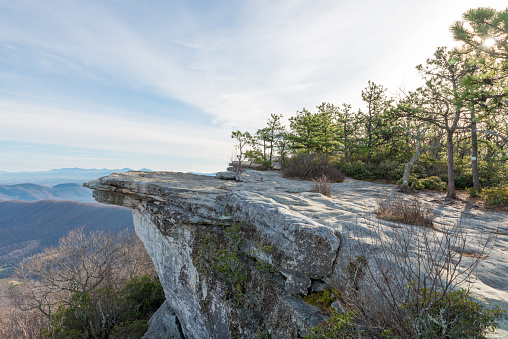 Overlook of a McAfee Knob and Blue Ridge mountains in Virginia, USA, on sunrise in autumn