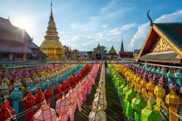 istock Wat Phra That Hariphunchai with traditional paper lanterns hanging on the rows during Yi peng (or Yee peng) festival in Lamphun province of Thailand. 1197040373