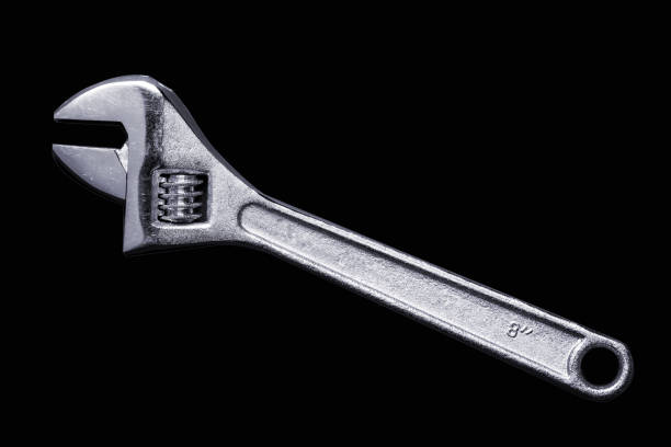 istock Adjustable wrench stainless steel isolated on black background. Silver Color 1197040399