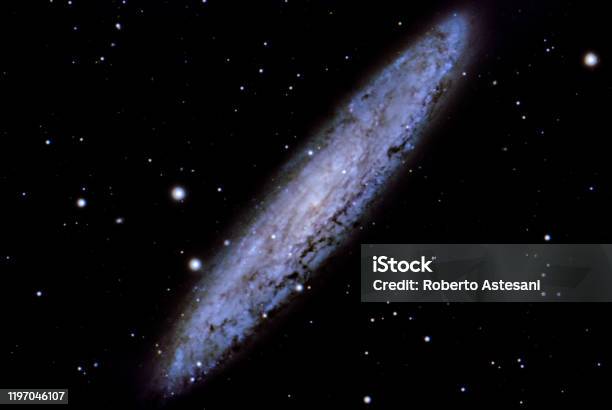 Ngc253 Sculptor Galaxy Stock Photo - Download Image Now - Ellipse, Galaxy, Astronomy