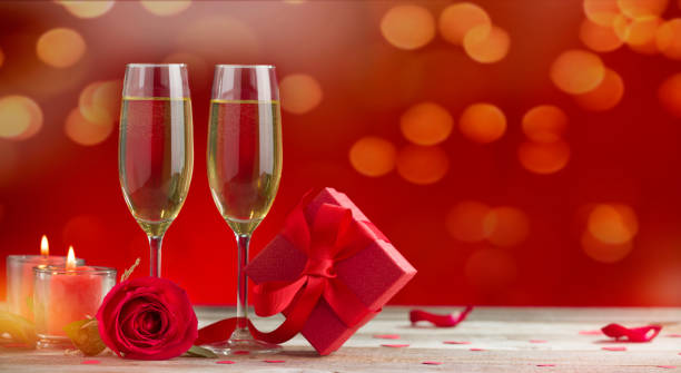 istock Champagne glasses and roses 1197050404