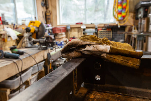Protective gloves lay on steel beams