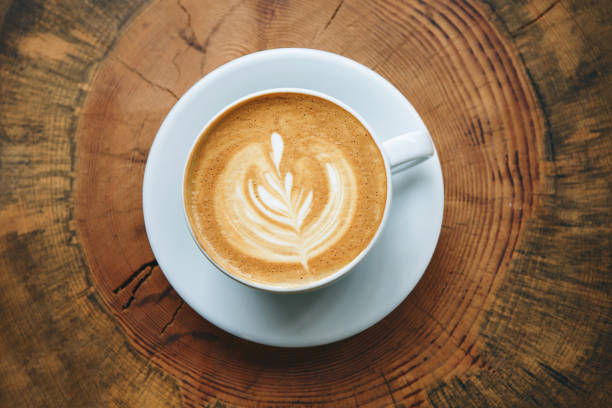 istock Cup of cappuccino on a wooden table 1197063217