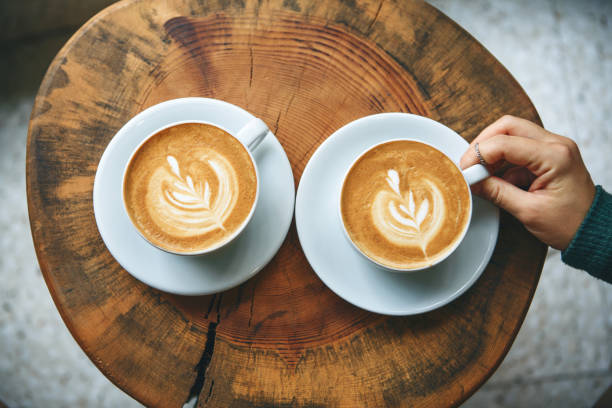 istock Cups of aromatic coffee cappuccino 1197063425