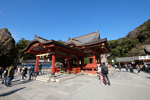 Kamakura,Kanagawa/Japan-Dec.2019: Tsurugaoka Hachimangu Shrine in sunny day. A Buddhist temple. Tourists around. Wide angle