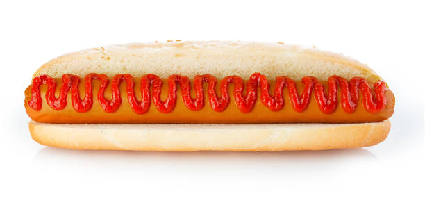 istock Classic hot dog with ketchup close-up isolated on a white background. 1197065366