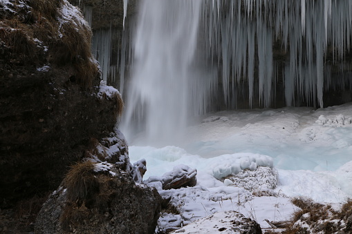 Icicles of frozen waterfall (Pericnik waterfall, Slovenia)