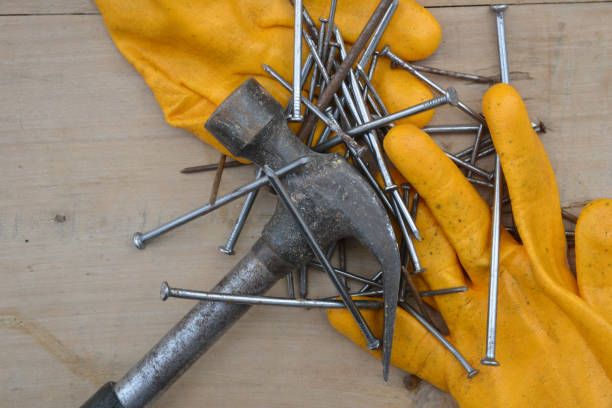 istock old construction of a house and repair tools 1197072905