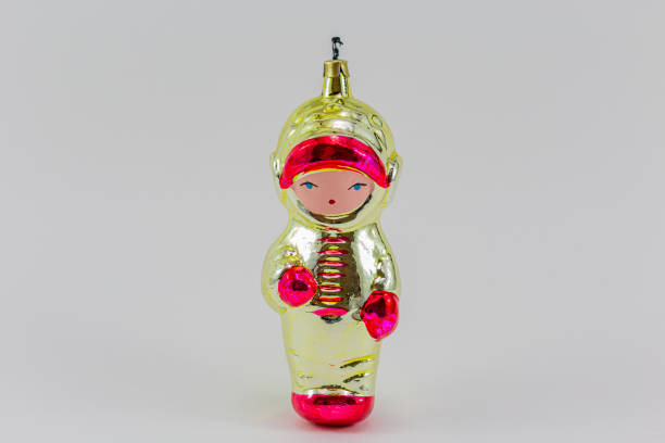 istock Retro Christmas tree decoration astronaut 1955 on grey background. 1197075124
