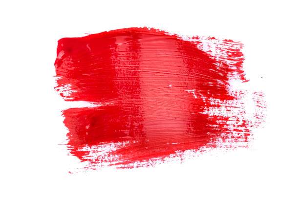 istock Red acrylic paint brush isolated on white background 1197075675
